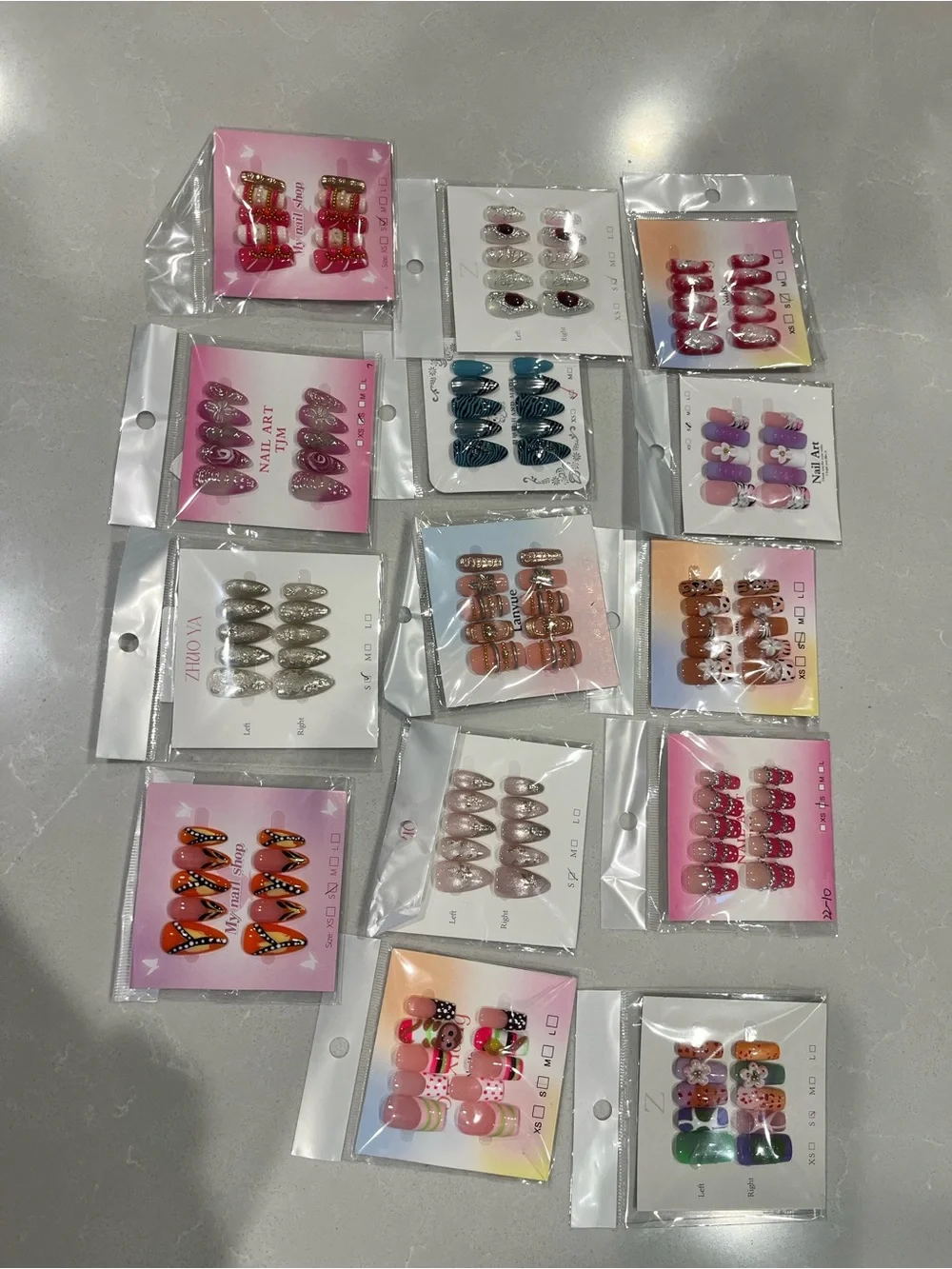 2 Mystery Sets of Press-On Nail Sets - Mixed Colors and Designs